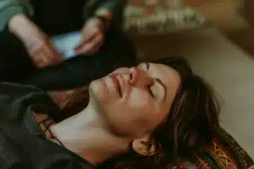 A woman receiving a hypnotic therapy session