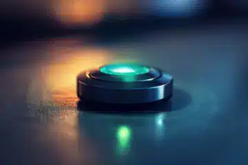 A glowing metallic magical button