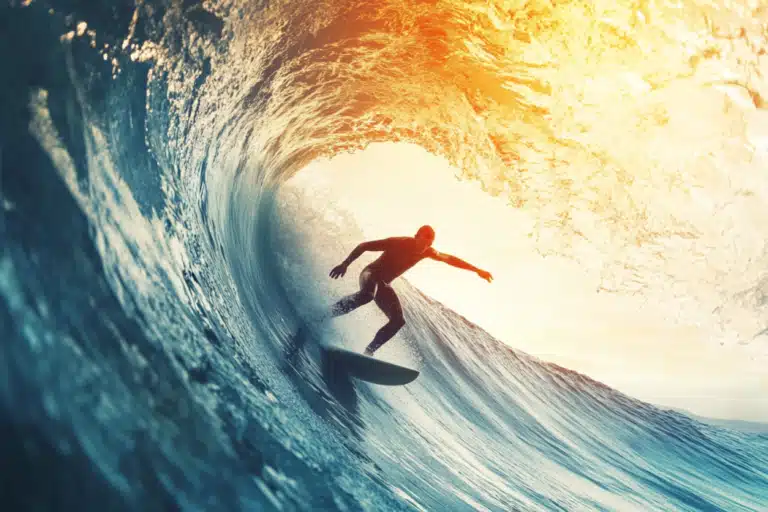 Man surfing a barrel wave