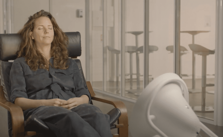 Woman seated during a Dream Machine light session