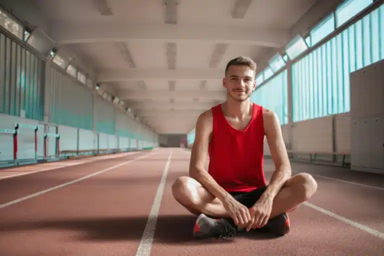 Man seated on a track