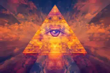 A purple eye peering out from a golden pyramid