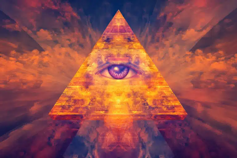 A purple eye peering out from a golden pyramid