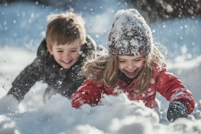 Children happily playing in the snow